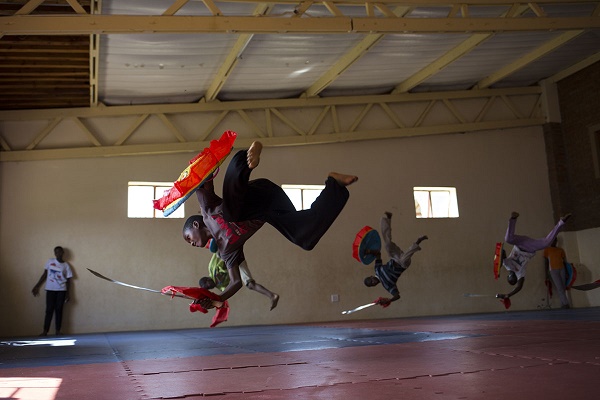 During Kung Fu classes here at the Amitofo Care Centre, Swaziland the 'senior' primary school children practise acrobatic moves in anticipation of a visit to the school by politicians and dignataries. The routines are tight and there are two main indoor gyms where the children practise. High energy is required to perfect the routines with coaches imploring them to get it right all the time. Some children love the art form, some do not. CORNELL TUKIRI © 02 March 2017