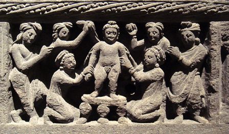The Buddha as a child, taking a bath. Gandhara, 2nd century CE