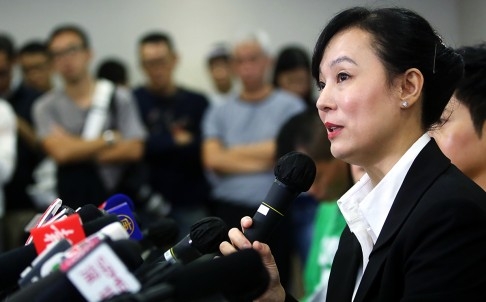 Mary Jean Reimer addresses a press conference on what she has discovered about Ting Wai Monastery. Photo: Sam Tsang