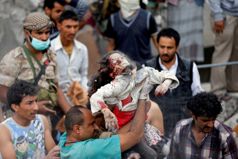 reuters-a-medic-holds-the-body-ayah-muhammad-mansour.jpg reuters-a-medic-holds-the-body-ayah-muhammad-mansour.jpg